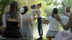 Lesbian couple kissing on their wedding ceremony Stock Footage