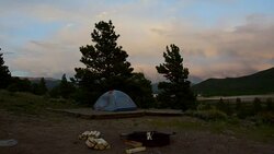 Tent and Campfire ready for the Night Sky Camping and Hiking Summer Fun Colorado Rocky Mountain Evening Stock Footage
