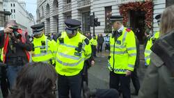 Environmental activists protest in London's financial district Instructional Video
