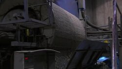 Surface mining equipment drops fine chunks of rock. Stock Footage