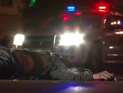 MS Shot of Dead gun shot victim on streets AUDIO / Ciudad Juarez, Juarez, Mexico Stock Footage