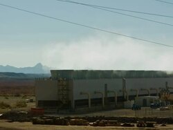 T/L, ZI, MS, Row of steam condenser towers at fossil fueled power plant in desert, Golden Shores, Arizona, USA Stock Footage
