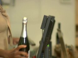 CU, Client paying for champagne in liquor shop, mid section, Soho, New York City, New York, USA Stock Footage