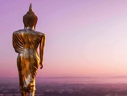 Thai buddha statue with sunrise Stock Footage