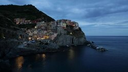 Italy, Liguria, Cinque Terre, Manarola, elevated view at dusk Stock Footage