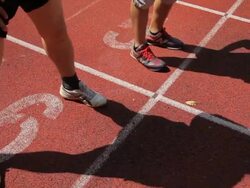 Couple running in sport track Stock Footage