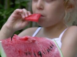 HD: Little Girl Eating Watermelon Stock Footage