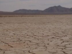  WS Landscape with cracks on arid desert / Mojave, California, USA Stock Footage