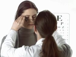 HD: Woman Trying On Glasses Stock Footage