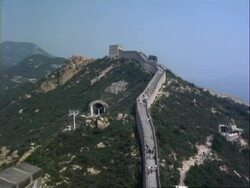 WA High angle view across hilly landscape with Great Wall of China and cable car, Badaling, China Stock Footage