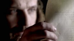 Nostradamus reads a piece of parchment. Stock Footage