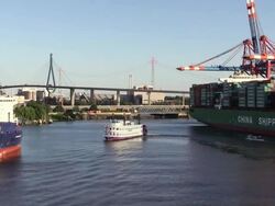 WS View of Kohlbrand Bridge with container ship for container terminal in harbour / Hamburg, Germany Stock Footage