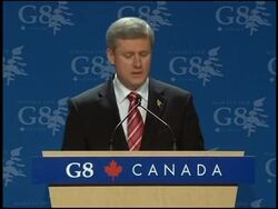 WRAP Family photo at G8, Harper, protest, Hu arrival News Clip