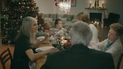 Family sitting on the table for christmas dinner. Stock Footage