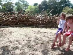 MS little boy and little girl on swing / Montezuma, Nicoya Peninsula, Costa Rica   Stock Footage