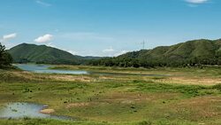 Clouds floating above a lake. Time lapse Stock Footage