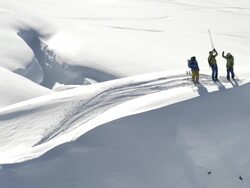 Skiers High Five in Alaska Stock Footage