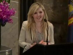 Abigail Breslin speaks at the podium for Project Sunshine in the lobby of the Empire State Building Stock Footage