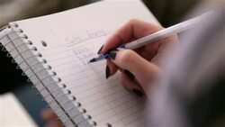 Female supervisor writes in notebook Stock Footage