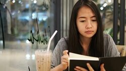 woman reading a book in the cafe Stock Footage