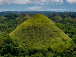 T/L, MS, HA, clouds and shadows passing over the Chocolate Hills / Bohol, Philippines Stock Footage