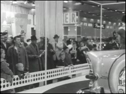 Montage: Narrator speaks at 1959 Chicago Auto Show Stock Footage