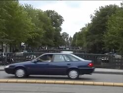 Amsterdam, Netherlands Canals: People, Bridges, Traffic Cityscape Stock Footage
