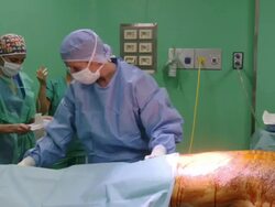  MS ZO Surgeon preparing for operation / Cagliari, Sardinia, Italy Stock Footage