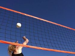 HD Super Slo-Mo: Beautiful Young Women Practicing Beach Volley Stock Footage