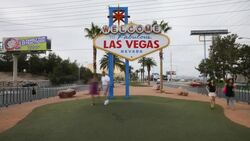 Groups of visitors pose for photographs in front of a Welcome to Fabulous Las Vegas Nevada sign. Stock Footage
