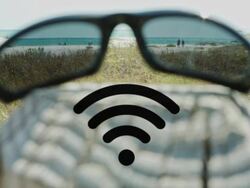 hotspot wifi Sunglasses on beach Technology communication Stock Footage