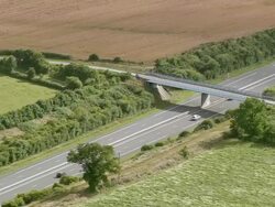 WS AERIAL View of cars running on highway and besides farm fields / Pais de la Loire, France Stock Footage