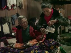 Elderly man receives medical care Stock Footage