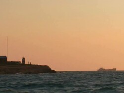 lighthouse and ship Stock Footage