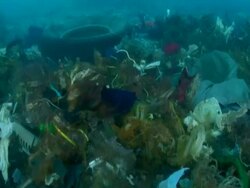 MS POV Under water traveling on sea garbage plastics and tires / Mediterranean, Lebanon Stock Footage