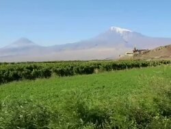 Khor Virap monastery, view of the church of the Holy Mother of God, Saint Astvatsatsin and the Ararat mountain in the background Stock Footage