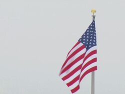  CU PAN American flag waving proudly on grey day / Saint Paul, Minnesota, United States  Stock Footage