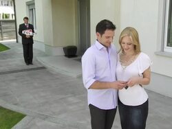 HD CRANE: Happy New Owners Holding The Keys Stock Footage