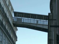 MS View of Footbridge from Santa Justa Elevator and one man crossing bridge / Lisbon, Lisbon, Portugal Stock Footage