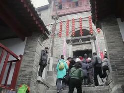 MS View of Front door and stairway to god of Medicines Temple at temple fair during chinese spring festival / tongchuan, shaanxi, china Stock Footage