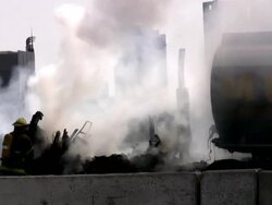 Firefighters, fire trucks on emergency site. Rescue mission, highway accident. Stock Footage