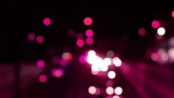 Defocused Traffic Lights at Night Stock Footage