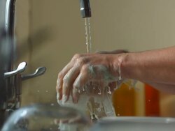 CU hands washing under tap, UK Stock Footage