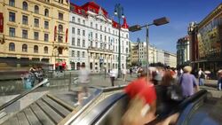 Pedestrians ride up an escalator from a metro station. Stock Footage