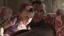 Grandpa Reading A Story To His Grandchildren Stock Footage