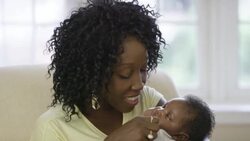 Mother with her newborn baby boy. Stock Footage