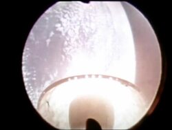 point of view of Mercury rocket stage separation / Earth in background Stock Footage