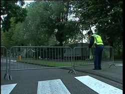 Model to testify at war crimes trial, court exteriors, security News Clip