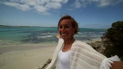 Young woman takes self portrait on kangaroo island Stock Footage