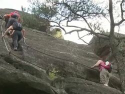 MS TD Hiker at altfels rock / Kastel-Staadt, Rhineland-Palatinate, Germany                            Stock Footage